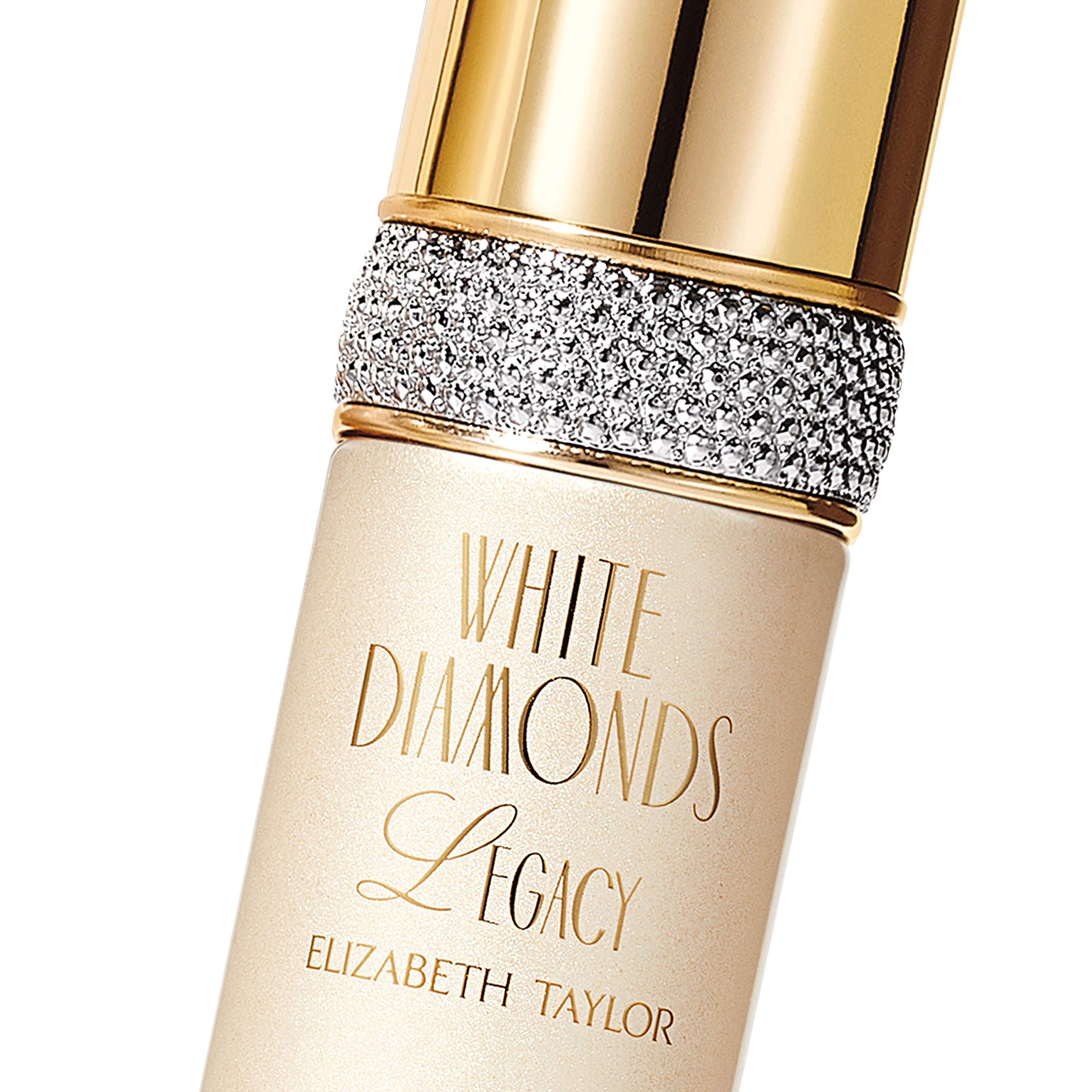 Elizabeth Taylor White Diamonds Legacy EDT spray beside bouquet evokes romance.