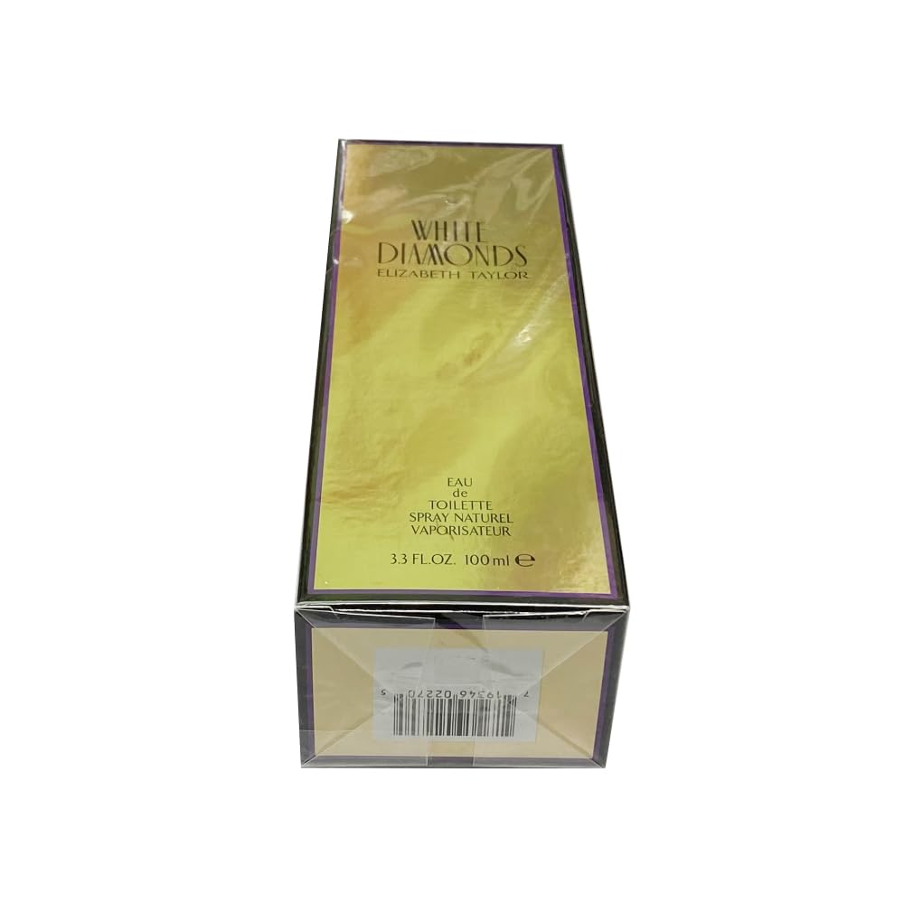 Elizabeth Taylor White Diamonds woman applying fragrance for a confident office-to-dine transition.
