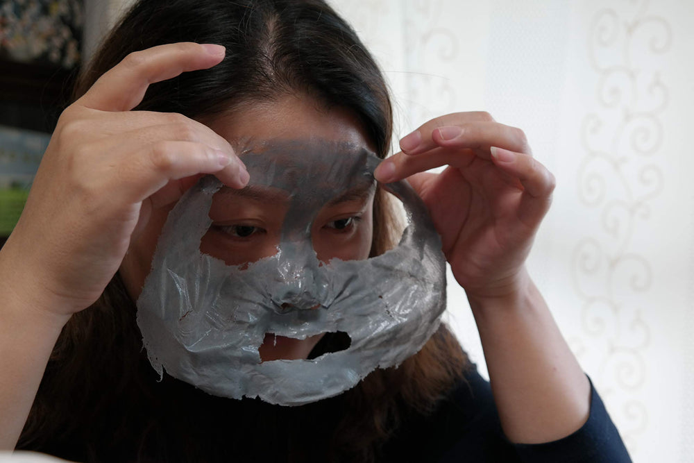 Elizavecca Milky Piggy Hell Pore Clean Up Mask face close-up with mask on.