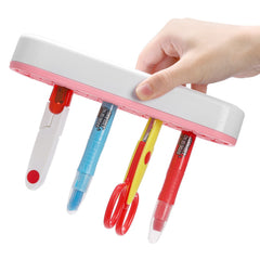 Elsjoy 3-pack silicone makeup brush holder black travel shot demonstrates portable organization on the go.