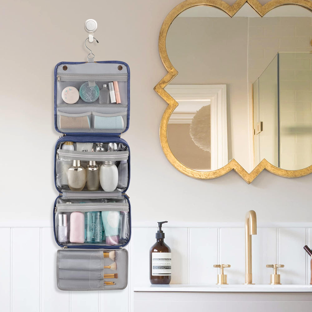 Elviros hanging toiletry bag middle compartments show visible PVC for quick item checks