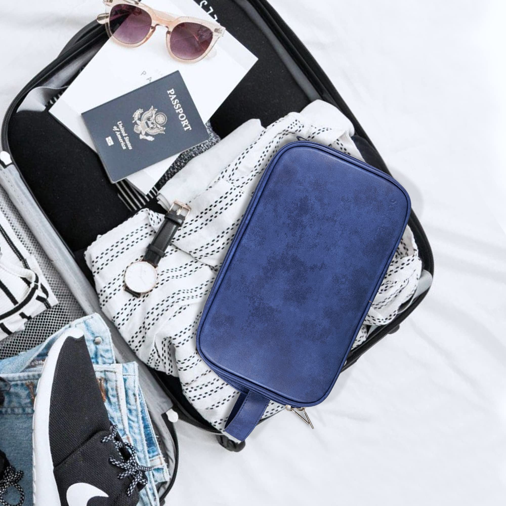 Elviros Toiletry Bag water-resistant material highlights moisture protection during trips.