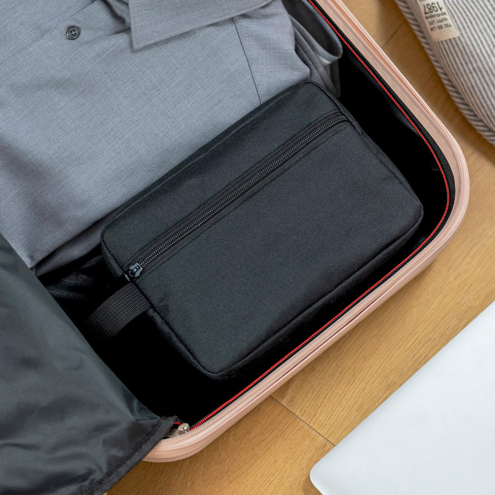 Elviros travel toiletry bag vacuum-packed packaging minimizes shipping volume.