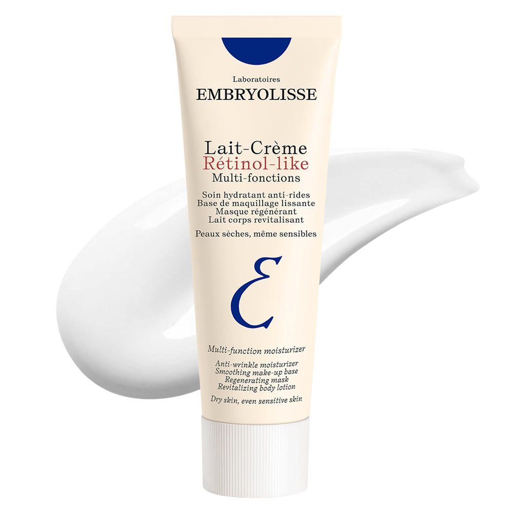 Embryolisse Lait-Crème bottle in hand for daily hydration and gentle anti-aging support.