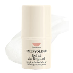 Embryolisse Radiant Eye Stick packaging shows portable design for on-the-go refreshment.