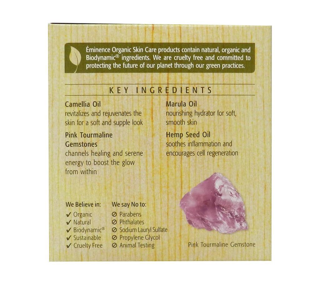 Close-up of Eminence Camellia Glow solid face oil texture shows silky, conditioning feel.