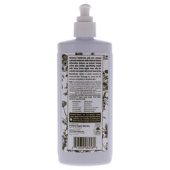 Eminence Coconut Firming Body Lotion being applied to skin for lasting moisture and subtle firming.