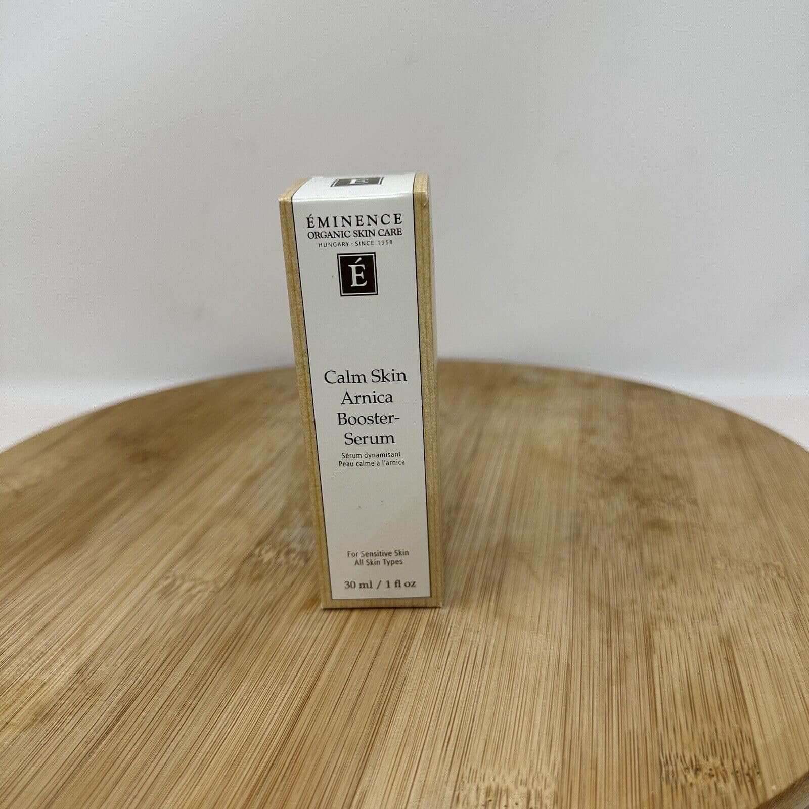 Eminence Rosacea-friendly Serum in use with a soft pump on clean skin
