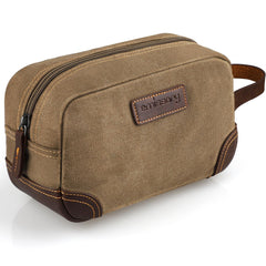 Emissary Dopp Kit front view in brown shows durable canvas and leather for travel.