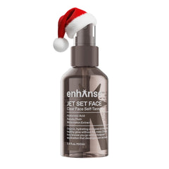 ENHANSE Jet Set Face Clear Self Tanner Mist on the face for a natural, non-orange glow