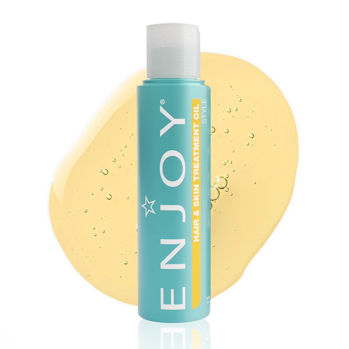 Enjoy Hair & Skin Treatment Oil bottle shows lightweight, fast-absorbing hydration for hair and skin.