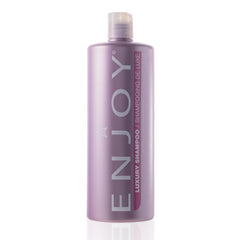 Enjoy Luxury Shampoo bottle pour demonstrates frizz-control for smoother hair