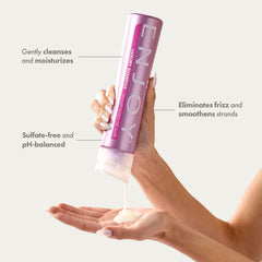 Enjoy Luxury Shampoo bottle closeup shows rich lather and moisture.