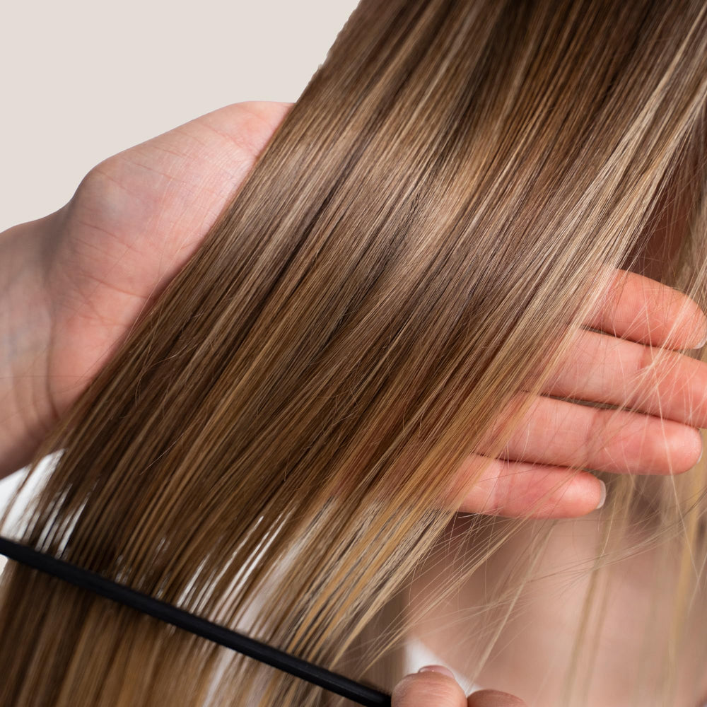 Enjoy Protect and Shine close-up of a smooth strand after use highlights humidity resistance