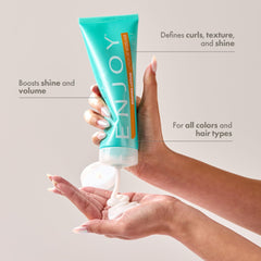 Enjoy Shaping Curly Hair Styling Cream texture close-up highlights curl definition and flexible body.