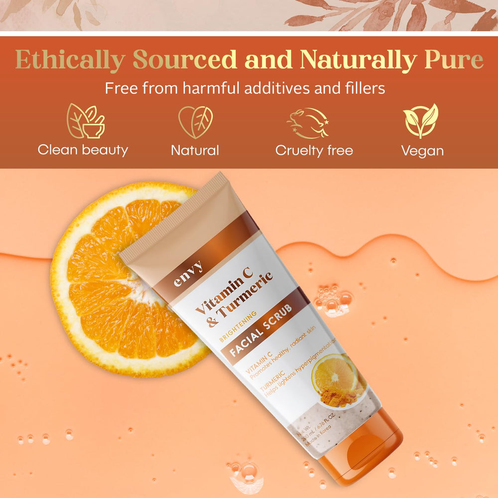 Envy Vitamin C and Turmeric Face Scrub tube resting on counter signals convenient daily use.
