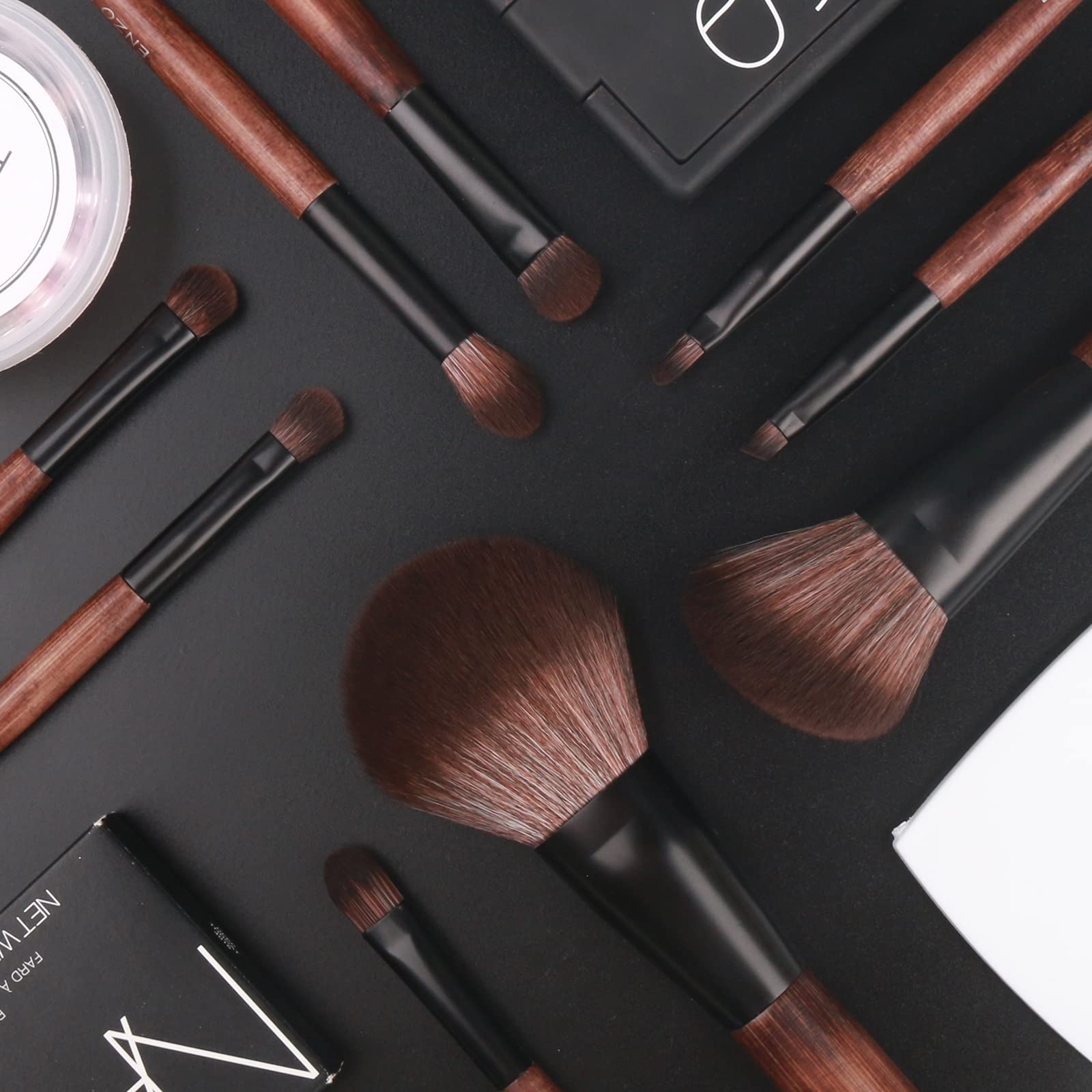 ENZO KEN travel-size brush set fits in purses for quick touchups.