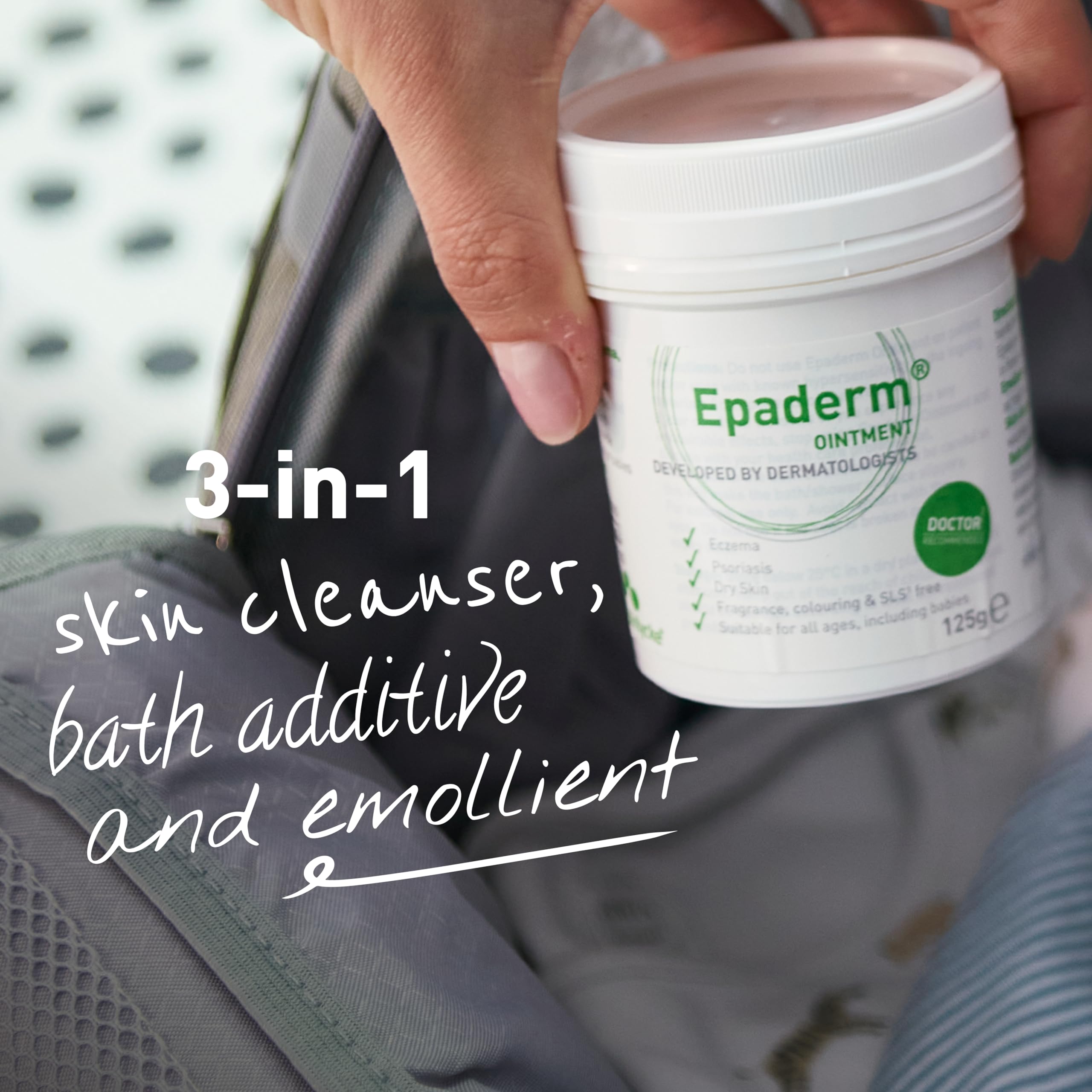 Epaderm 125g hand-application demonstrates easy smoothing on dry areas.