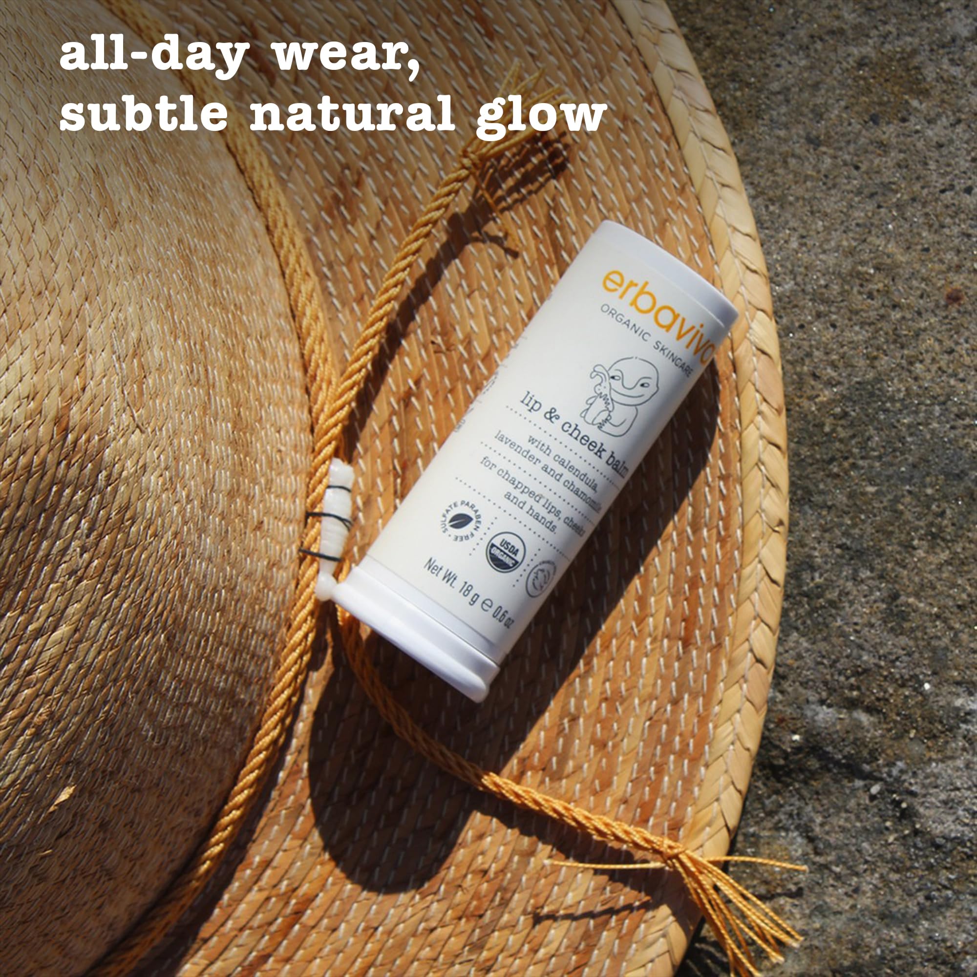 Erbaviva travel-size balm shown in diaper bag or purse.