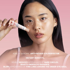 Erborian Skin Hero Eye Cream close-up reveals peach pigments for brighter under-eye appearance.