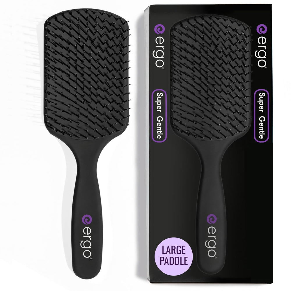 ERGO Super Gentle Paddle Brush handle closeup showing ergonomic grip for comfortable detangling