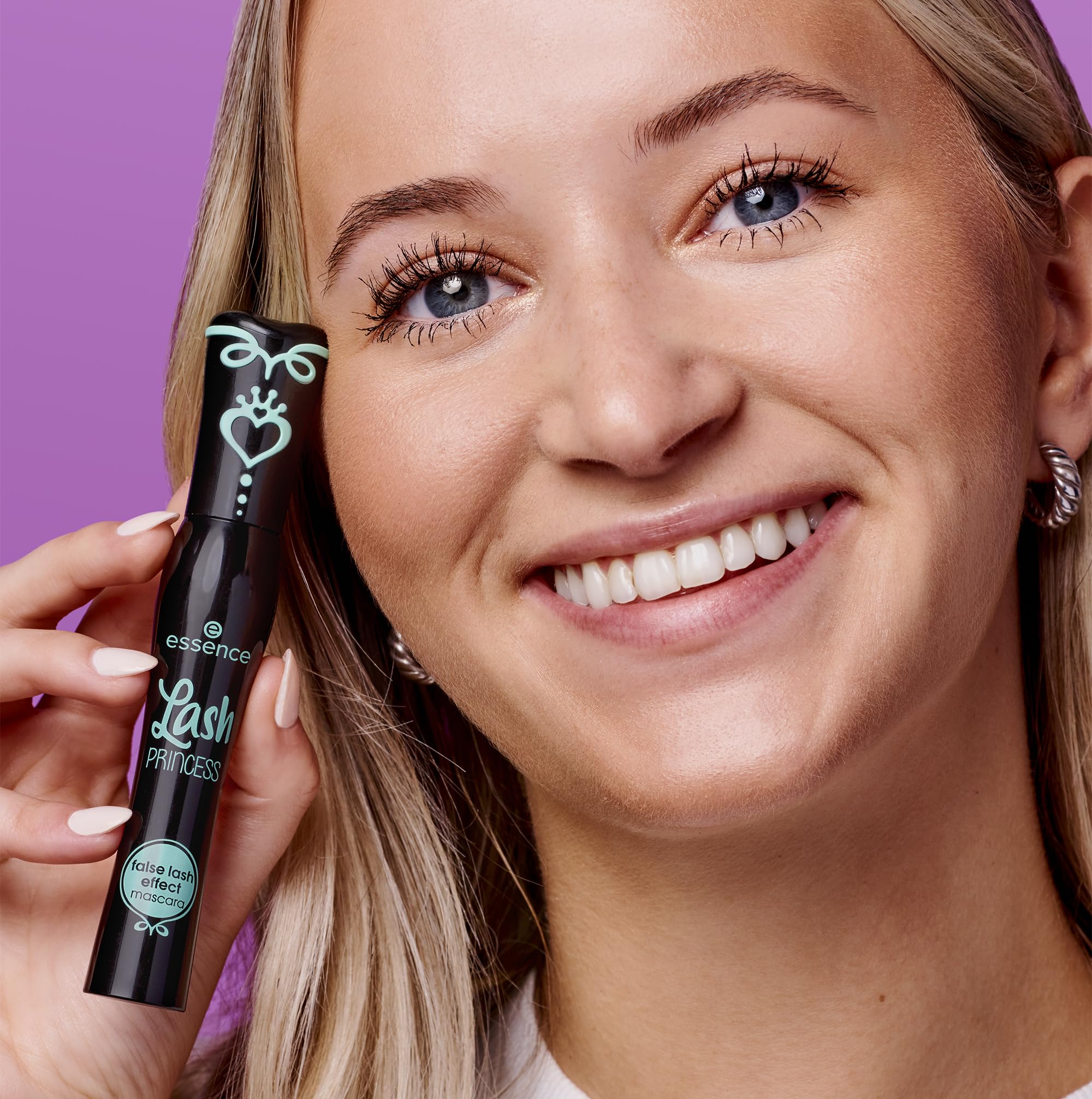 Essence Lash Princess application in hand mirror demonstrating easy control and grooming benefit