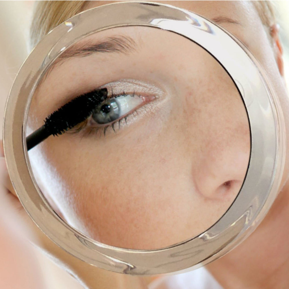 Essential Skin Solutions 6-inch round mirror with large viewing area for accurate detail.