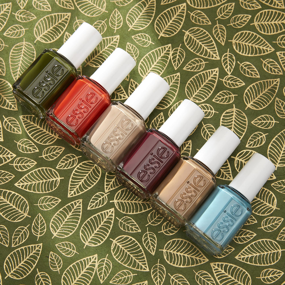 essie apricot cuticle oil bottle shows nourishing care for neat nails.