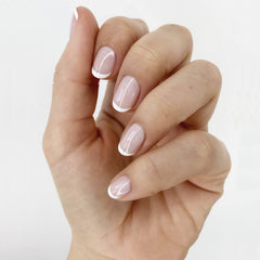 essie Ballet Slippers on nails highlights silky formula and effortless glide for a clean manicure.