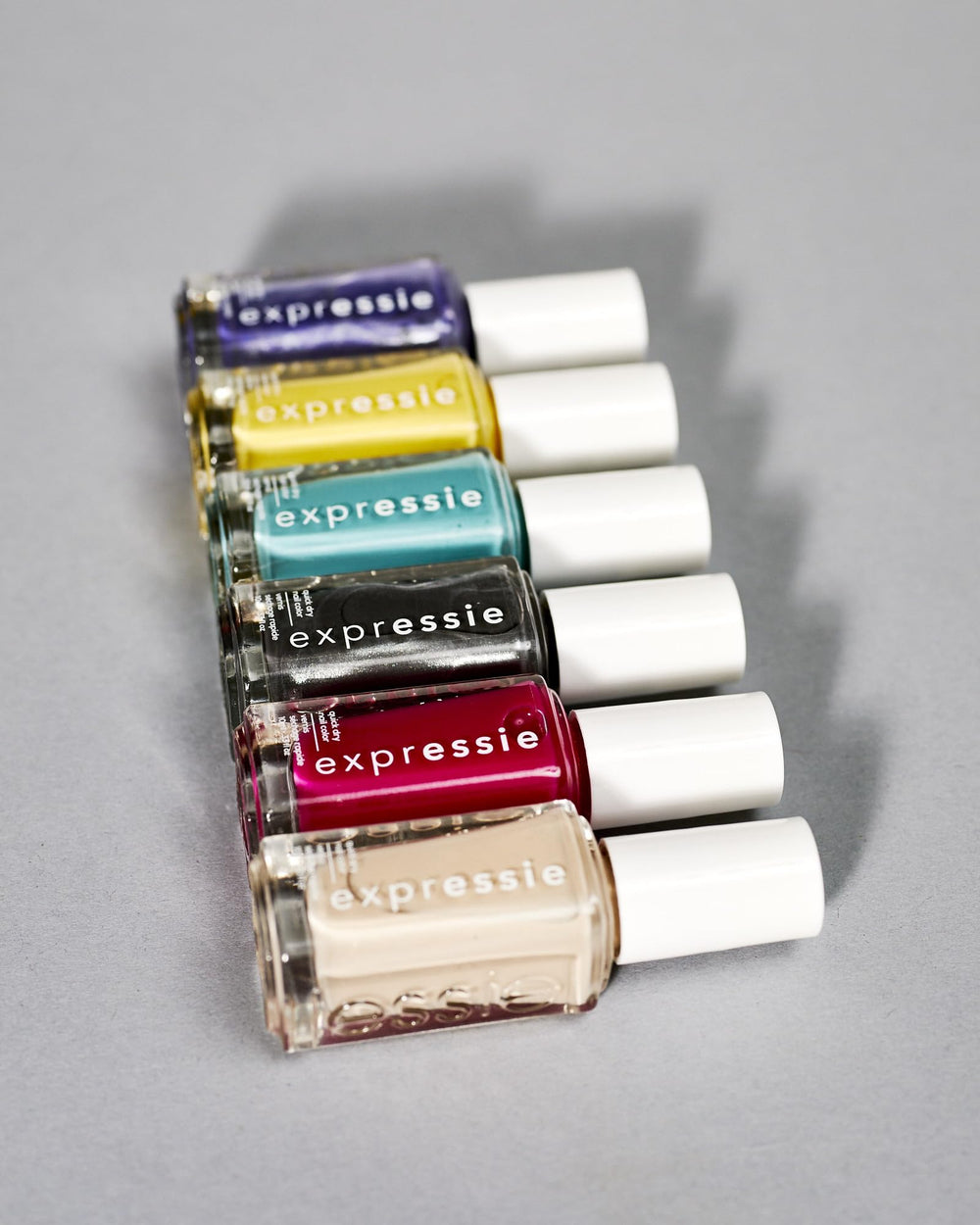 essie expressie display stand featuring millennium momentum shade.