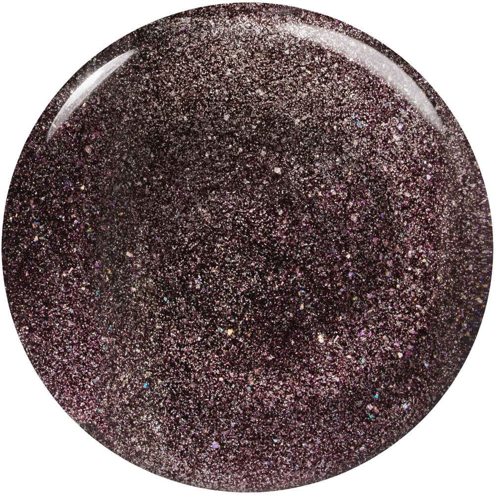 essie Nail Polish Black Shimmer on nails shows glittery evening look.