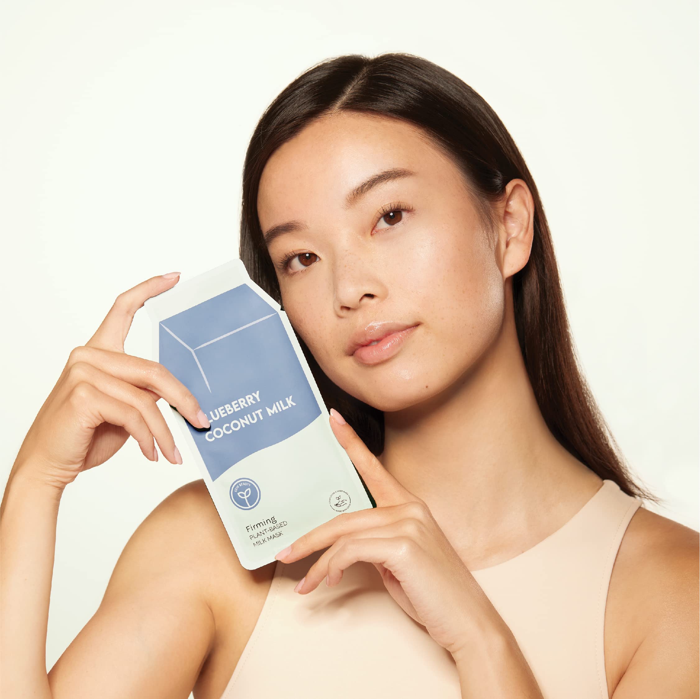 ESW Beauty coconut extract closeup emphasizes soothing, hydrating properties for tired skin.
