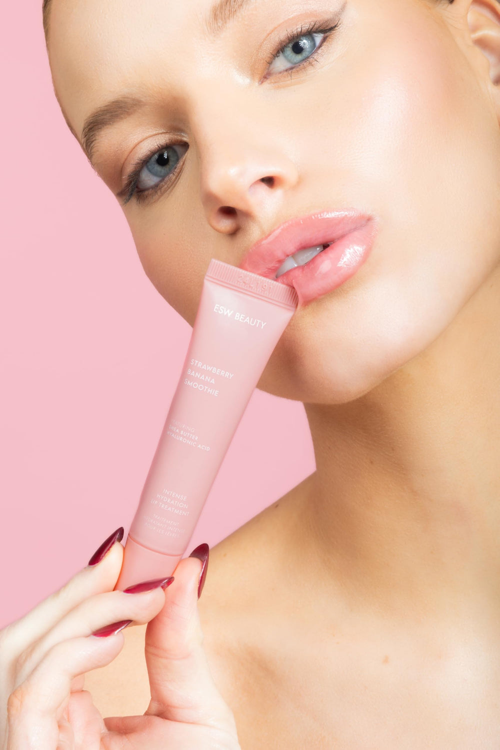 ESW Beauty Strawberry Banana Smoothie Lip Treatment packaging highlights compact design and protection.