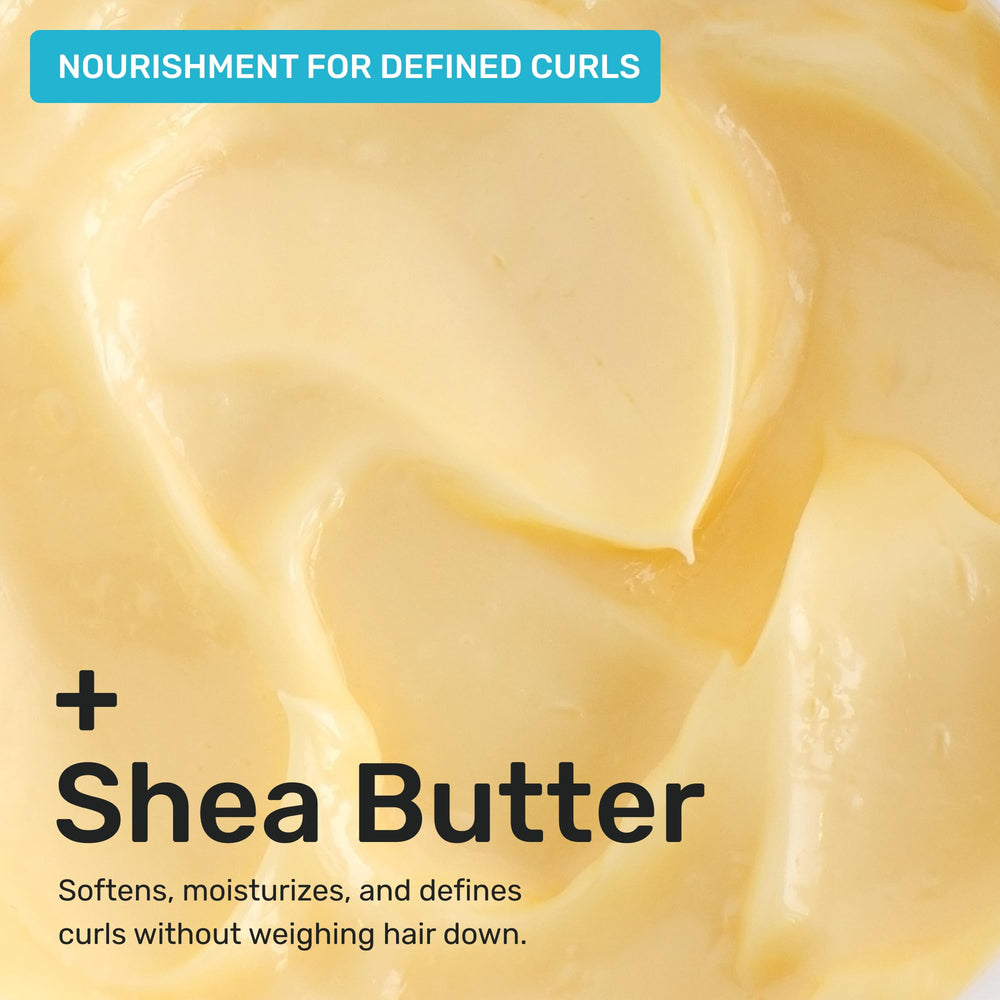 Ethique conditioner bar on damp hair during application for defined curls