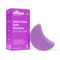 Ethique Smoothing Shampoo Bar packaging shows compact, plastic-free design for eco-conscious travelers.