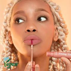 ETUDE Fixing Tint wand close-up shows precise lip color application.