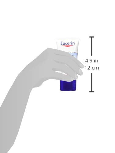 Eucerin moisturizing cream on dry patches for sustained hydration.