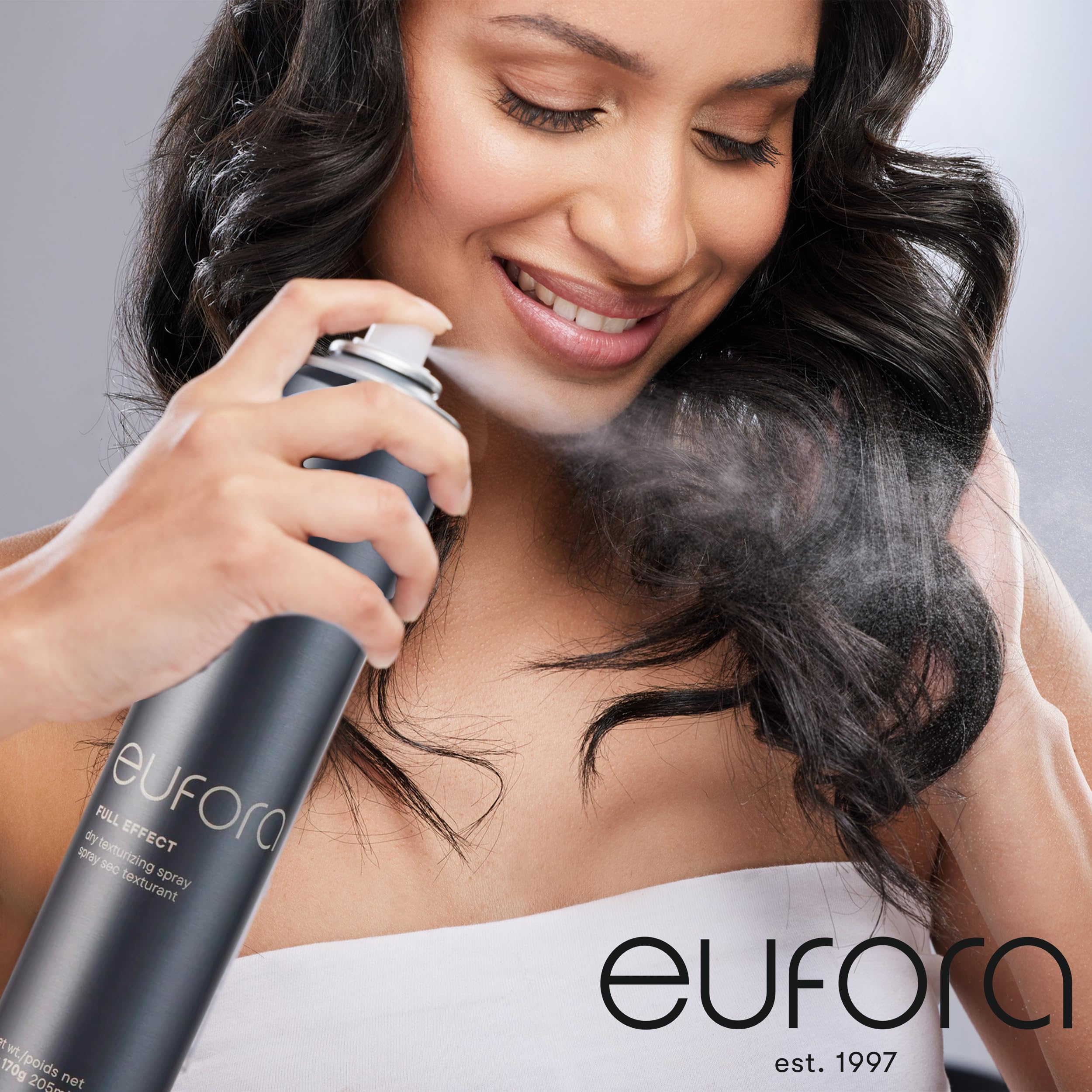 Eufora Full Effect Texturizing Spray mist dispensed for even coverage