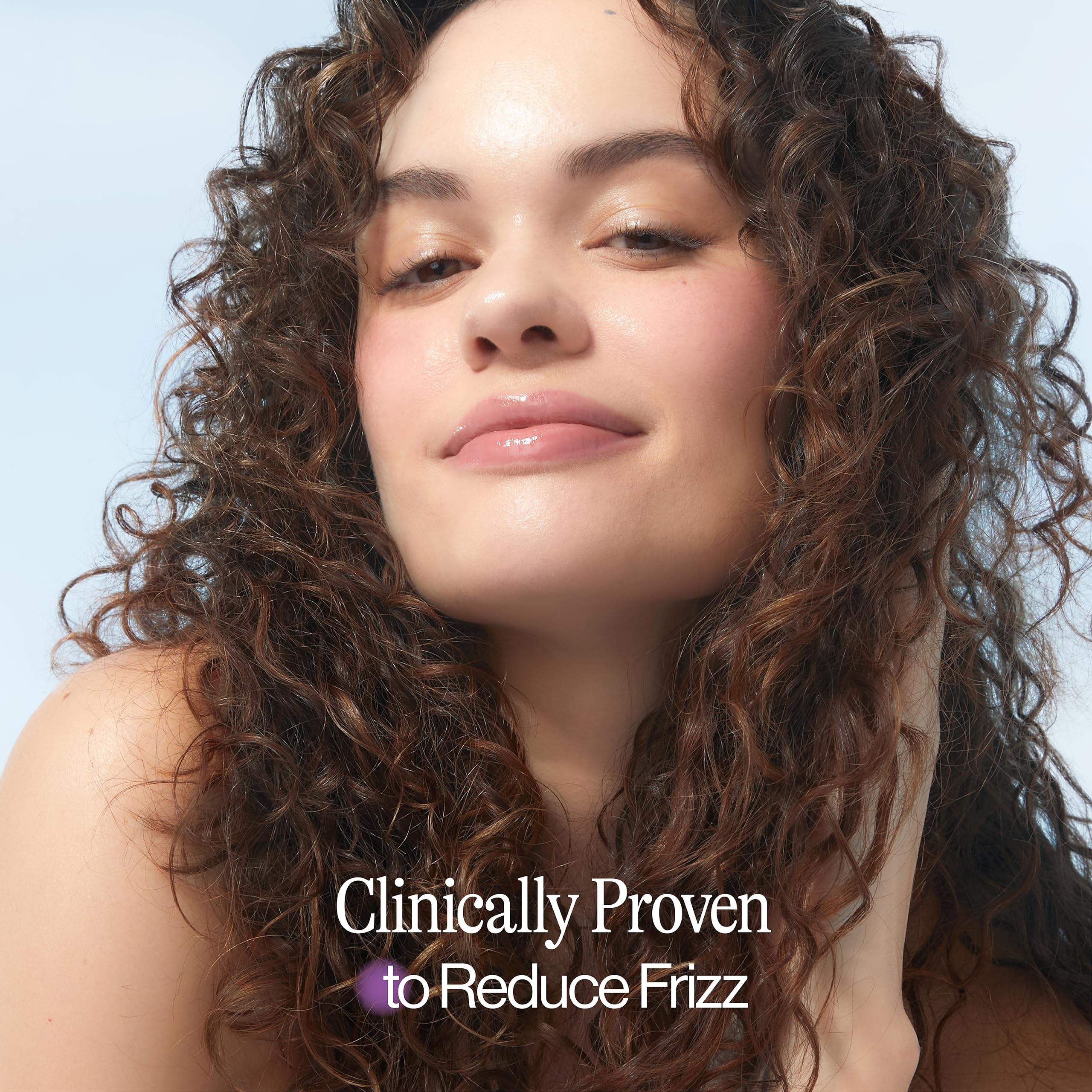 EVA NYC Mane Magic Nourishing Hair Oil ingredients closeup featuring argan and coconut oils