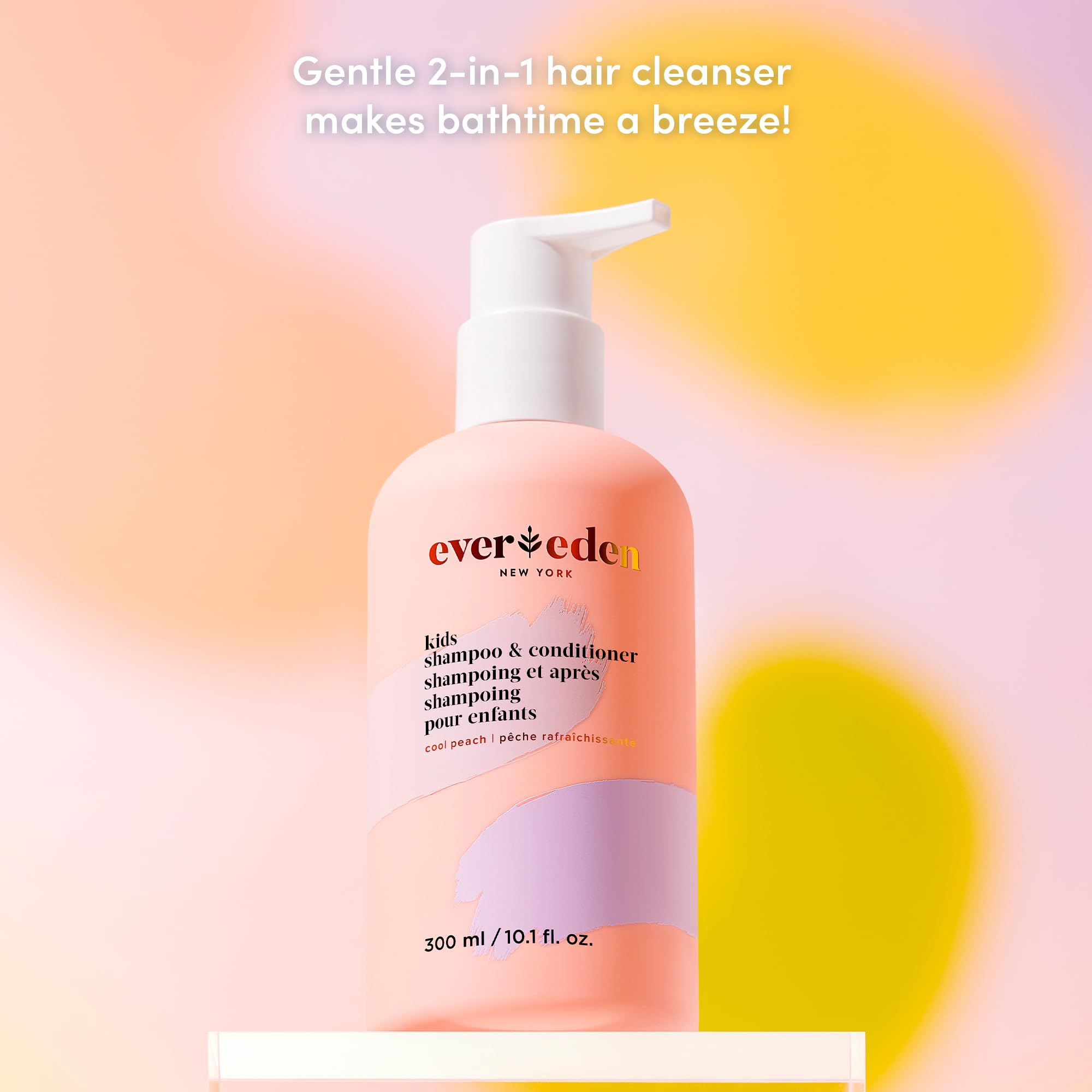 Evereden 2-in-1 Cool Peach lather; shows soft, manageable hair after washing.
