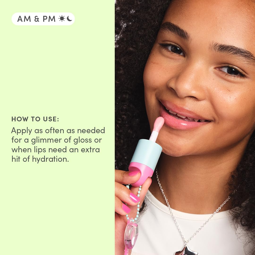 Evereden lip gloss close-up reveals glossy texture and color payoff ideal for playful moments.