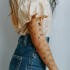 Everjoy minimalist tattoo scattered stars for subtle festival accents.