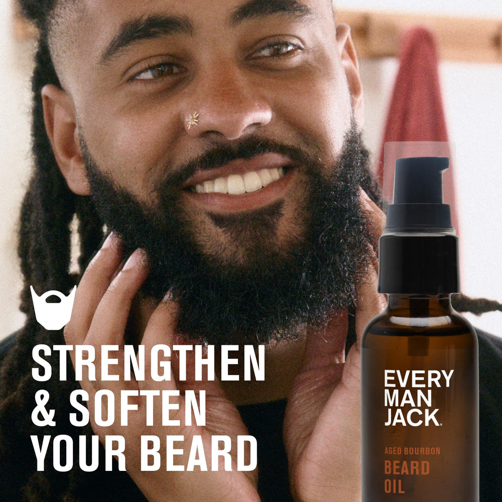 Every Man Jack beard oil being applied to beard for softness and skin nourishment.