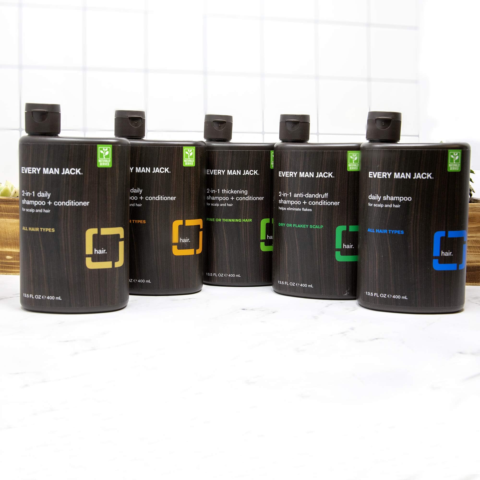 Every Man Jack conditioner spread on hair demonstrates smooth detangling and manageable style.