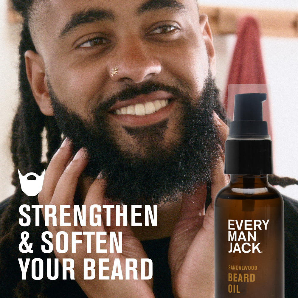 Every Man Jack sandalwood beard oil dropper enabling precise application.