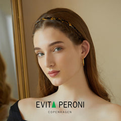 EVITA PERONI headband-size-adjust demonstrates flexible fit for comfort during daily activities