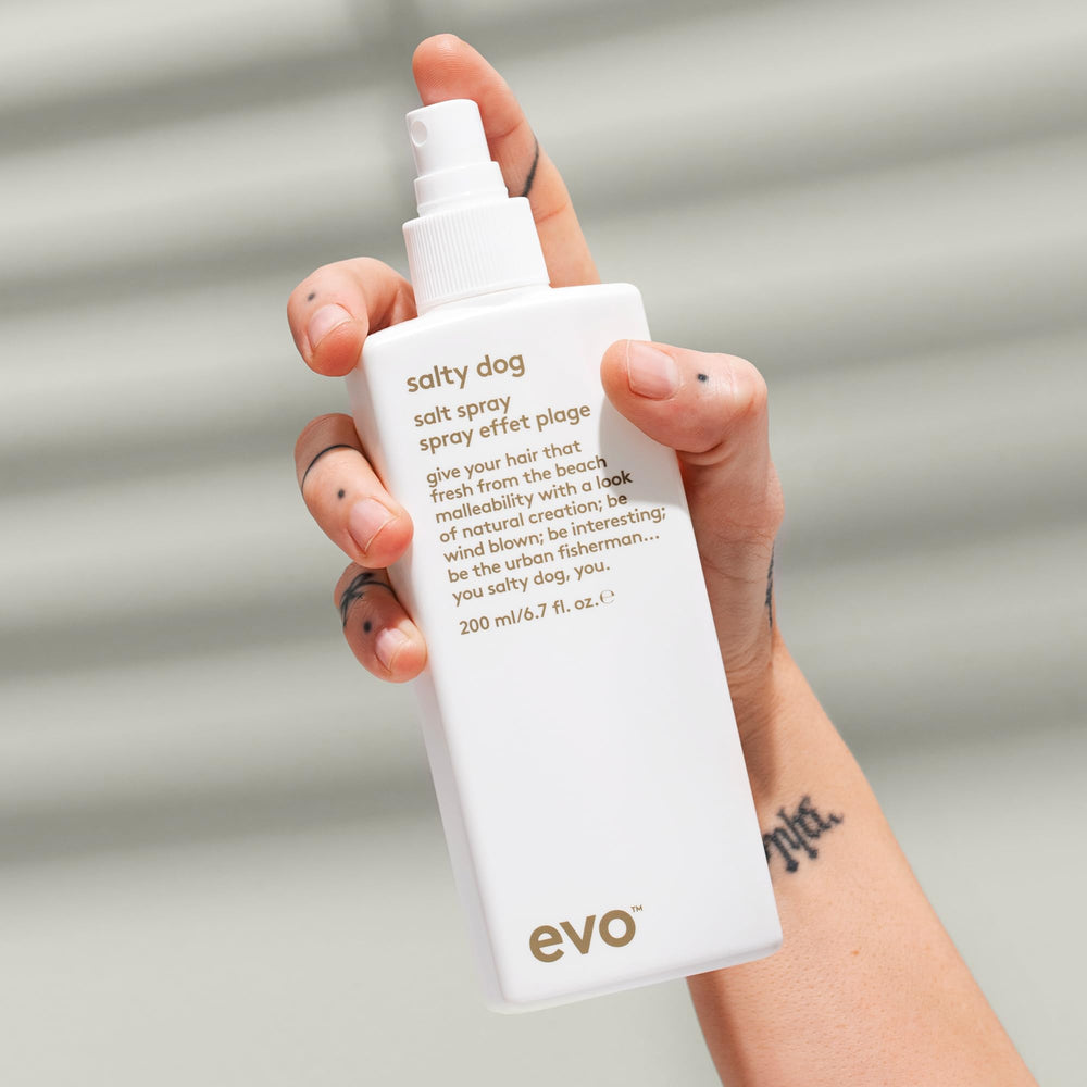EVO Salty Dog Salt Spray on air-dried hair for natural finish.