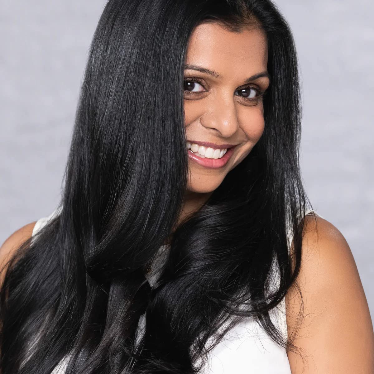 EVOLVh UltraShine conditioner paired with shampoo and leave-in yields radiance