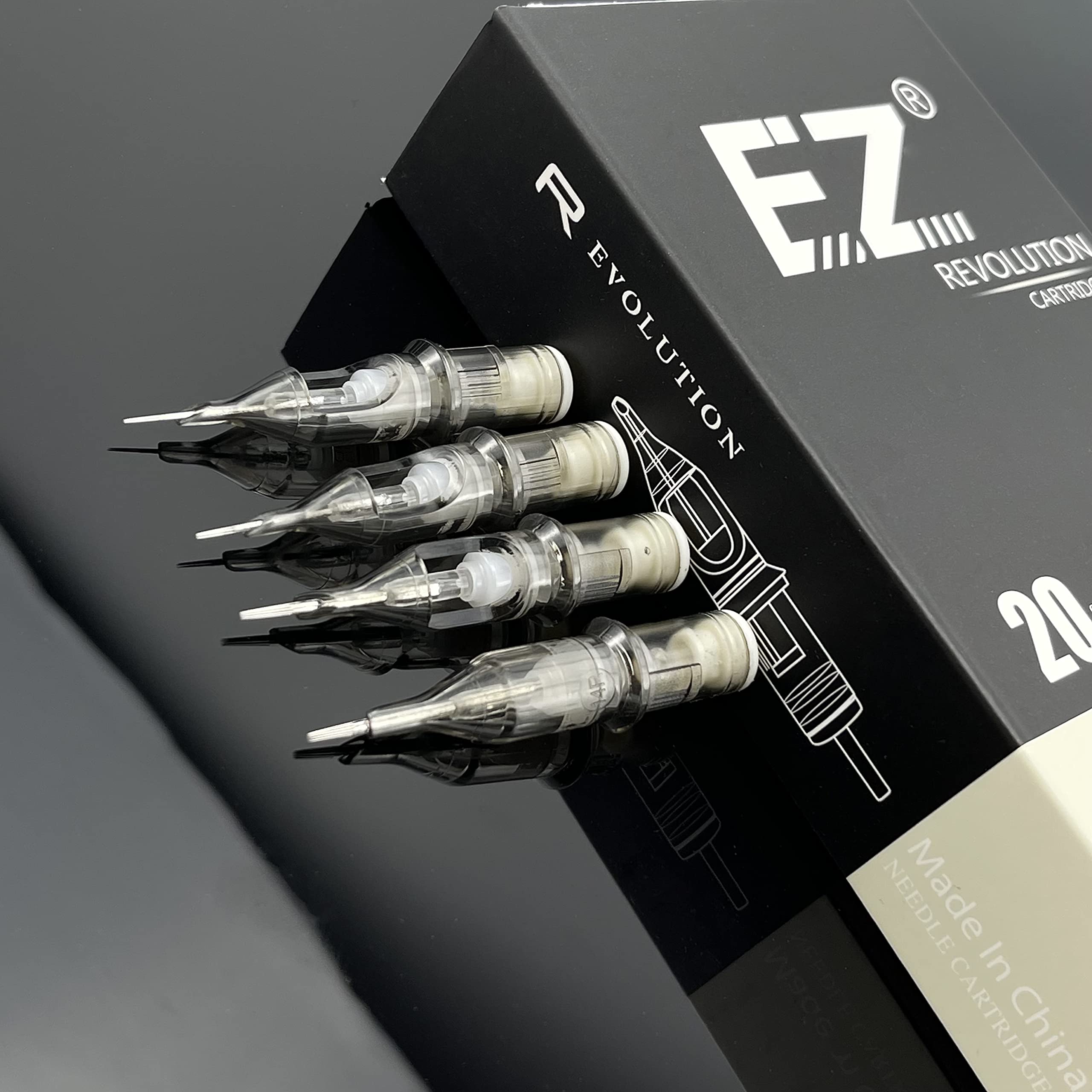 EZTAT2 Revolution needles with clear tip for improved visibility during tattooing.