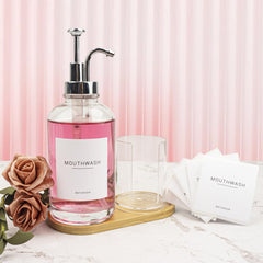 Ezebesta clear glass bottle close-up highlighting premium, leak-free dispensing